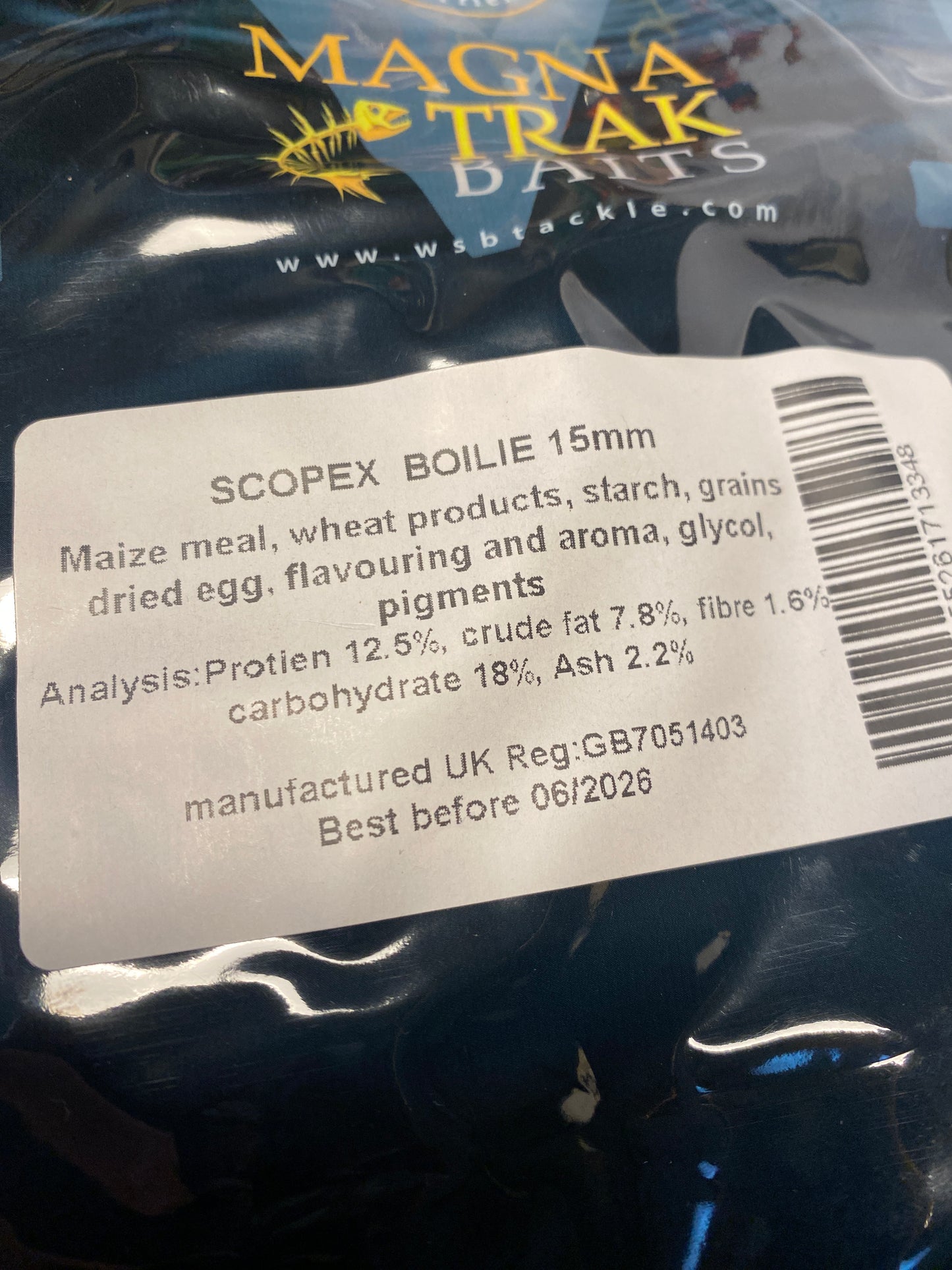 Close-up of a SCOPEX BOILIE 15mm packaging label with branding and product details.