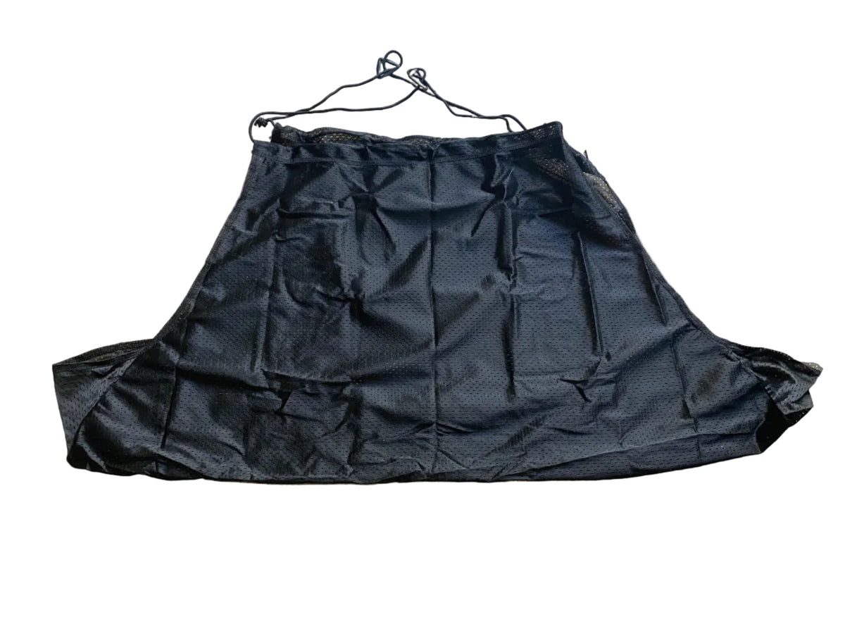 A black mesh athletic shorts cover-up with drawstrings, laid flat on a beige tiled floor.