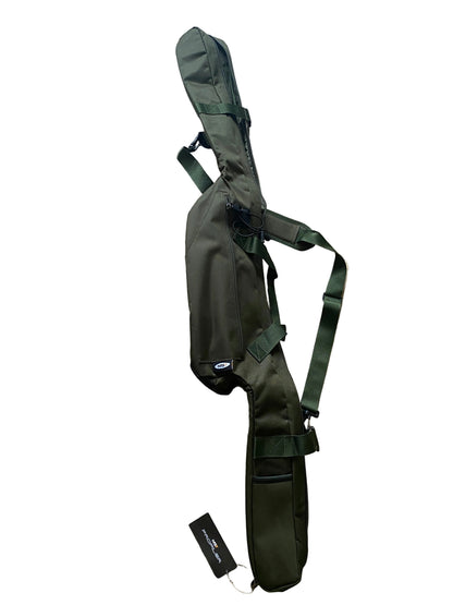 An olive green rifle case with a shoulder strap, laid out on a beige tiled floor next to a black product tag.