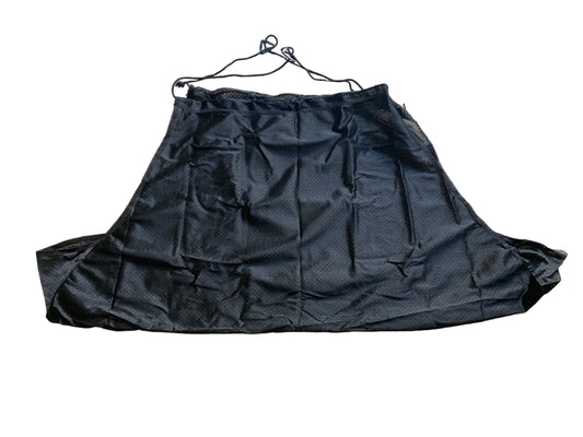 A black mesh athletic shorts cover-up with drawstrings, laid flat on a beige tiled floor.