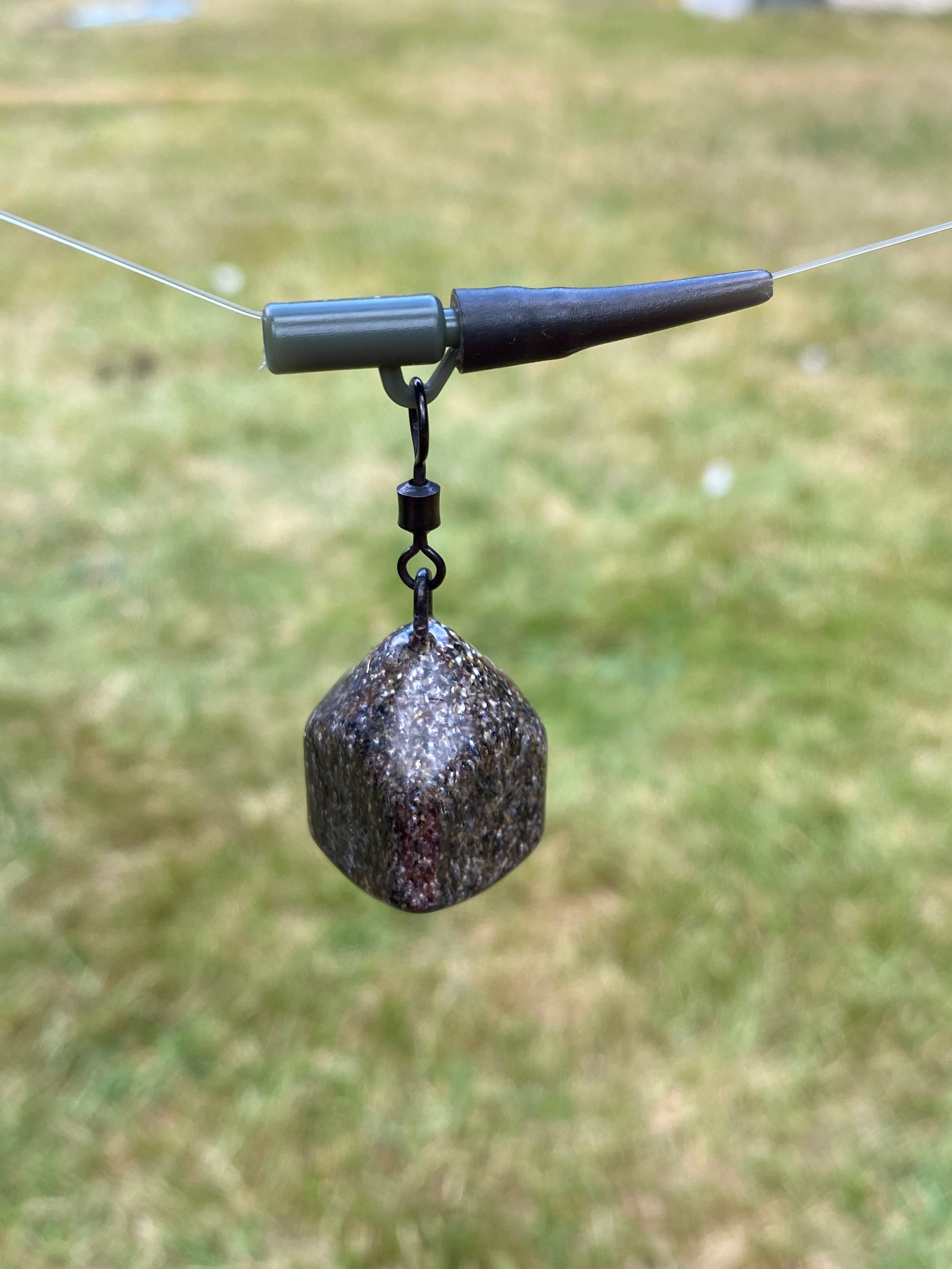 square carp fishing leads on a lead clip