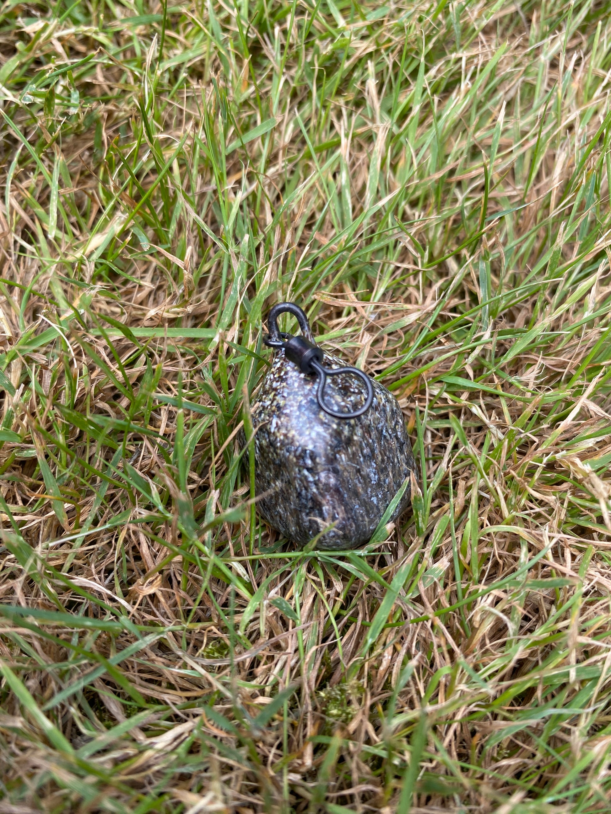 Fishing weight on grass